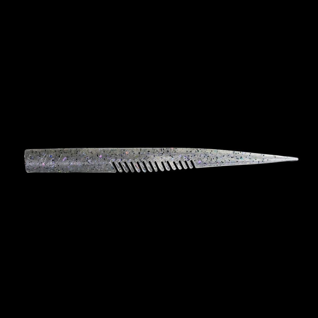 silver comb-like texture fishing lure on a black background