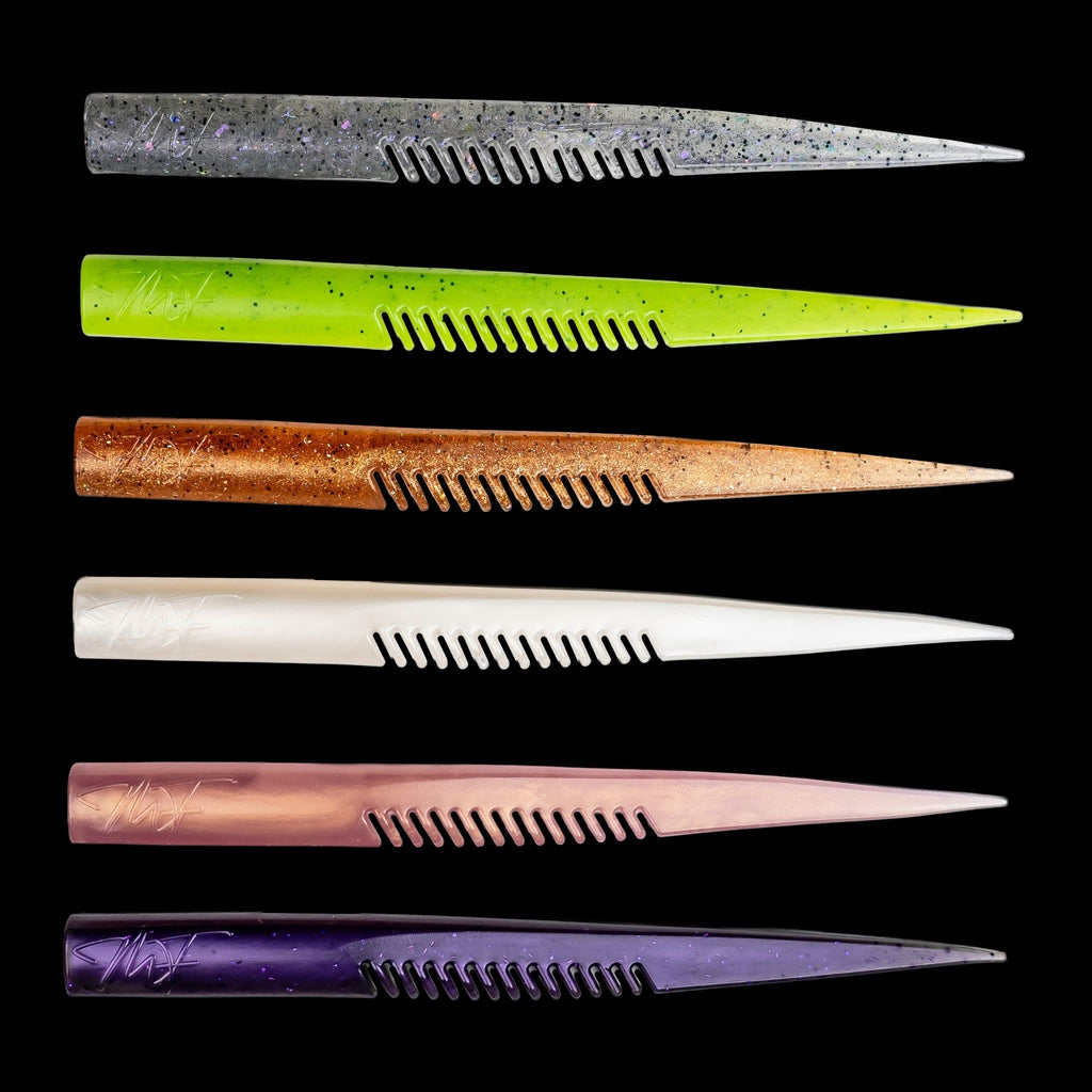 Assorted fishing lures with different colors  on a black background
