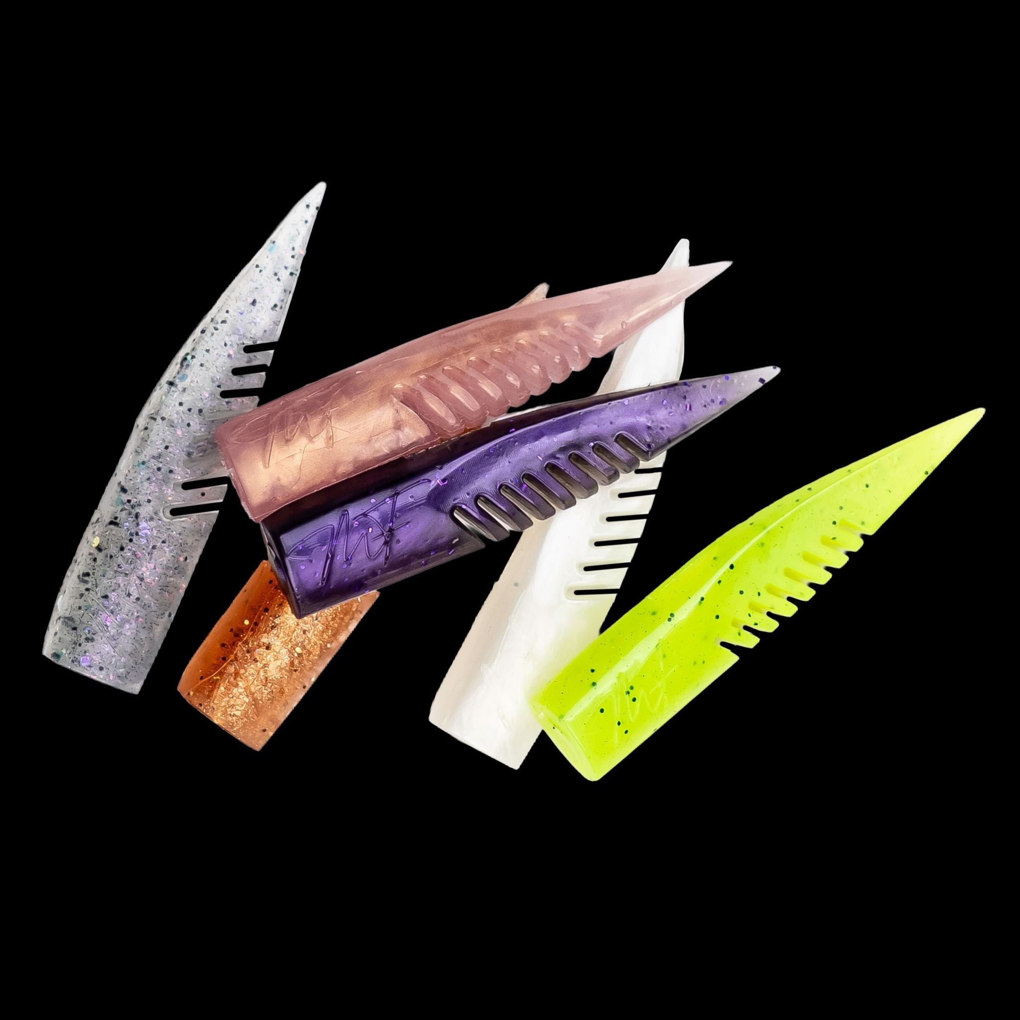 Set of colorful fishing lures on a black background