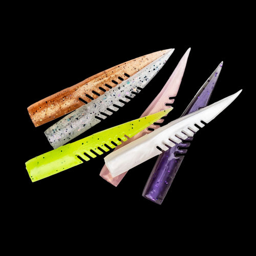 assortment of colorful plastic fishing lures with a comb-like texture on a black background