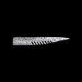 silver fishing lure with a comb-like texture on a black background