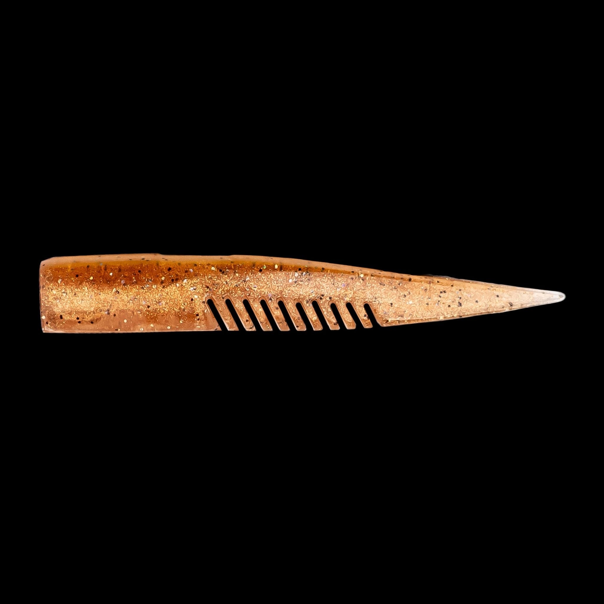 brown comb-like texture fishing lure on a black background