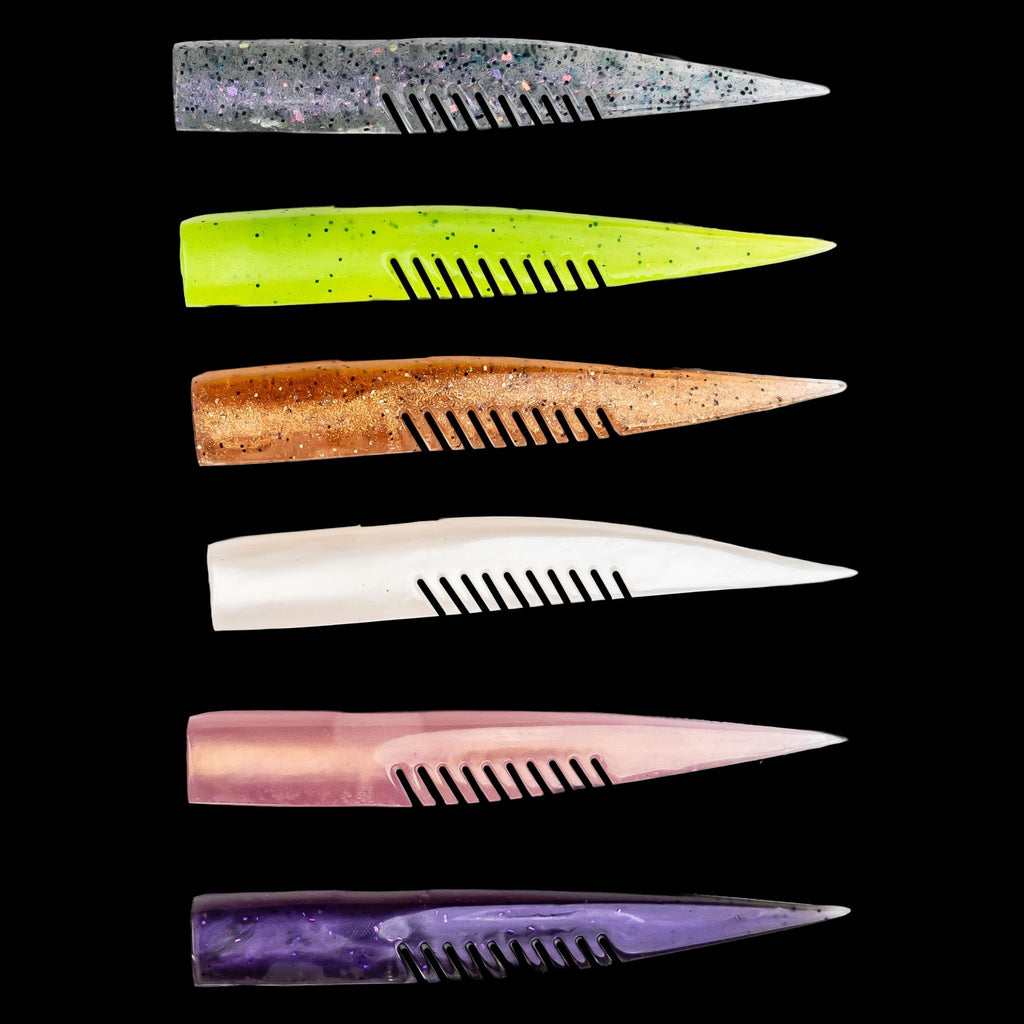 Assorted fishing lures with different colors  on a black background