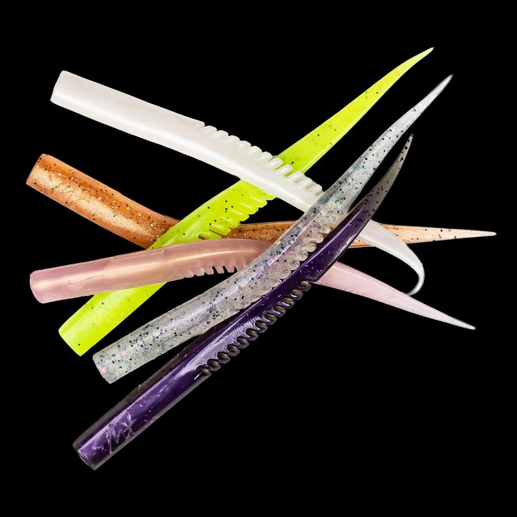 Set of colorful fishing lures on a black background