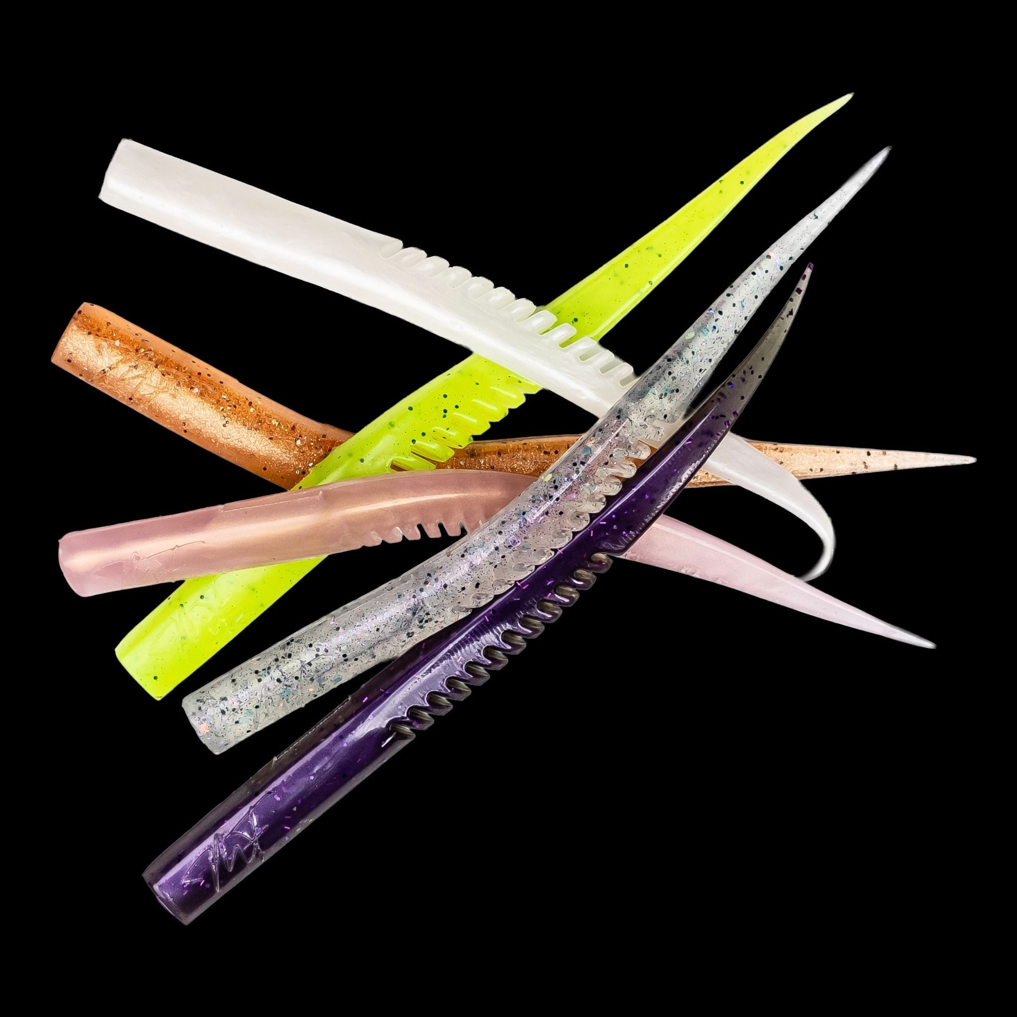Set of colorful fishing lures on a black background