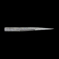 silver fishing lure on black background