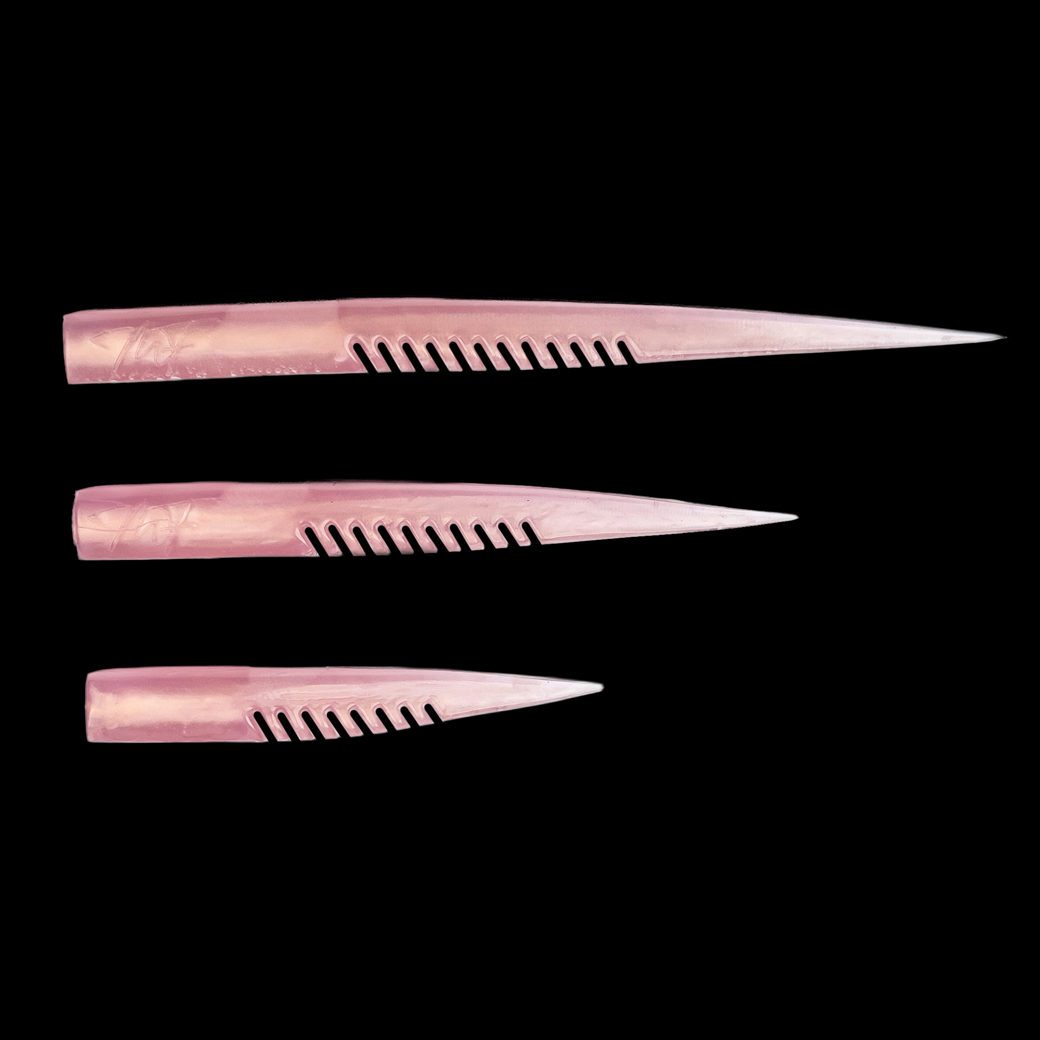 Three pink lures in each product size
